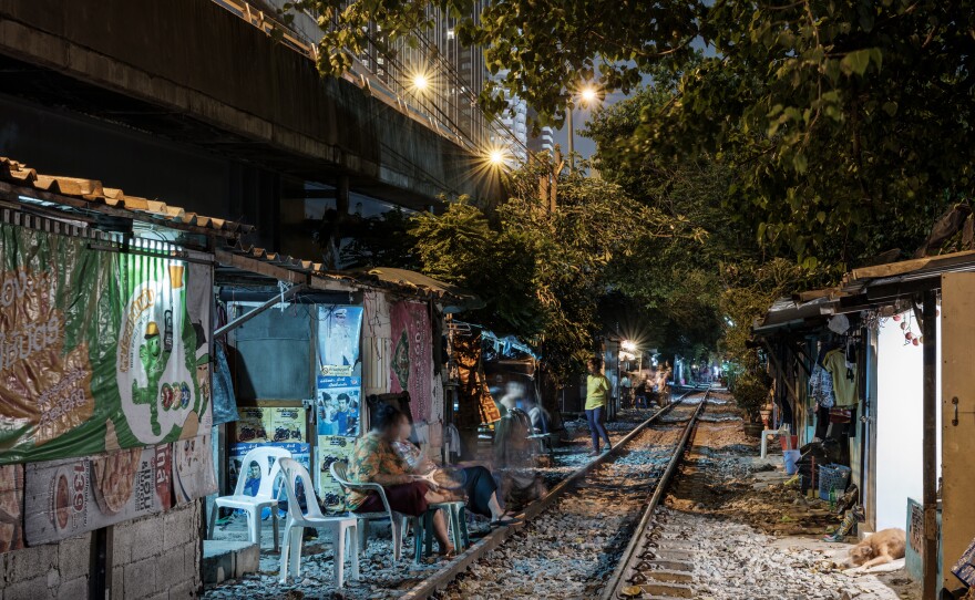 In Bangkok, communities of poor people live under expressways and besides train tracks. They have been especially hard-hit by the economic downturn triggered by Thailand's efforts to suppress COVID-19.