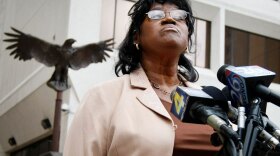 Sherrel Johnson, the mother of James Brissette who was killed on the Danziger Bridge in the aftermath of Hurricane Katrina, speaks to reporters on April 7 outside a federal court in New Orleans. Former New Orleans police officer Michael Hunter pleaded guilty that day in connection with a police cover-up of their shooting of unarmed civilians.