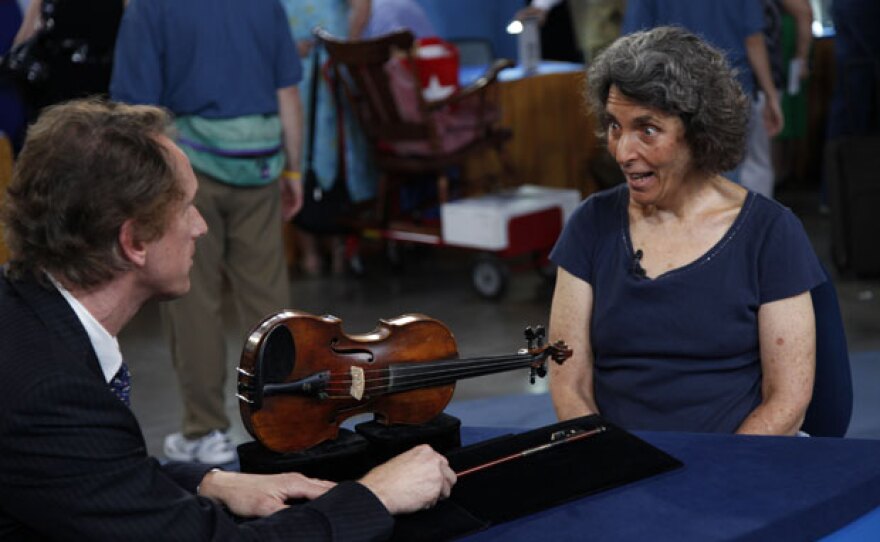 At "Antiques Roadshow" in Phoenix, Arizona, this guest brings in a violin made by the Gagliano family in Naples in the early 1800s and a violin bow made in France in the shop of Jean-Baptiste Vuillaume. Appraiser David Bonsey estimates the pair to be worth between $72,000 and $94,000.