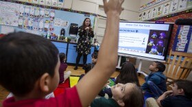 First-grade teacher Leticia Denoya uses puppets, as part of the Feel Your Best Self program developed at the University of Connecticut, to help students deal with emotions.