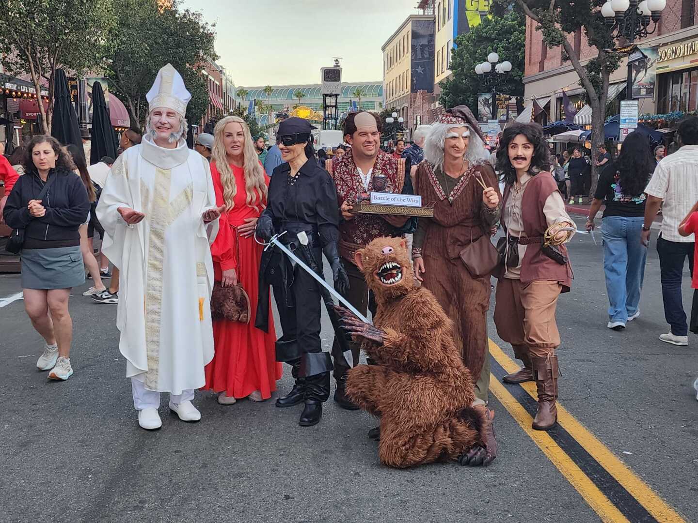 A group of cosplayers pose as cast members from "The Princess Bride" in the Gaslamp Quarter on July 26, 2025.