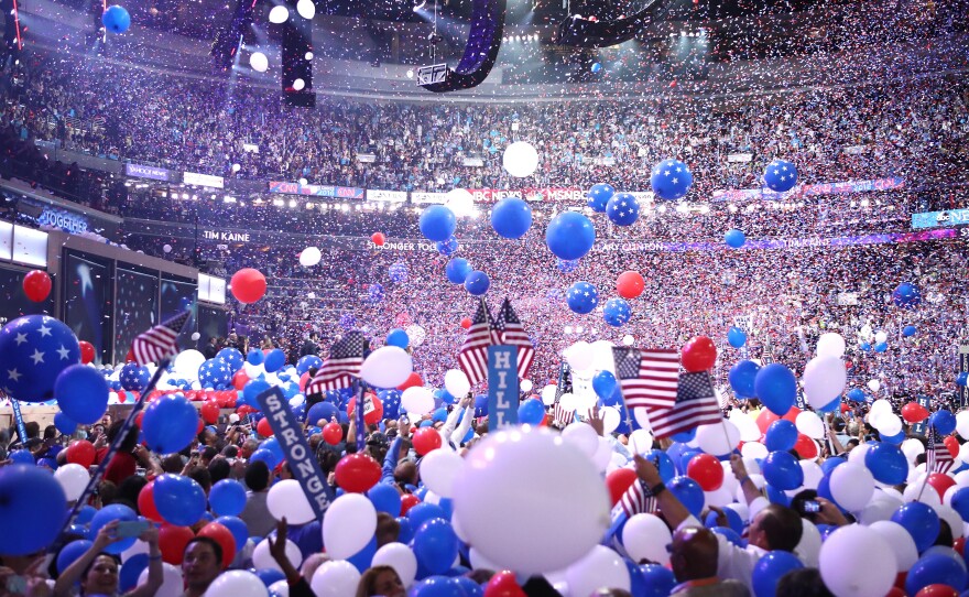 Balloons fall over delegates and attendees at the Wells Fargo Center in Philadelphia.