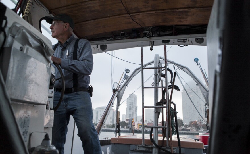 Commercial fisherman Phil Harris steers his boat out of San Diego Bay in August 2016.