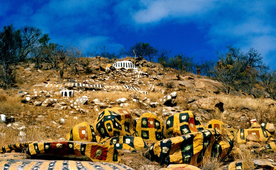 The painted rocks seem mysteriously alive.