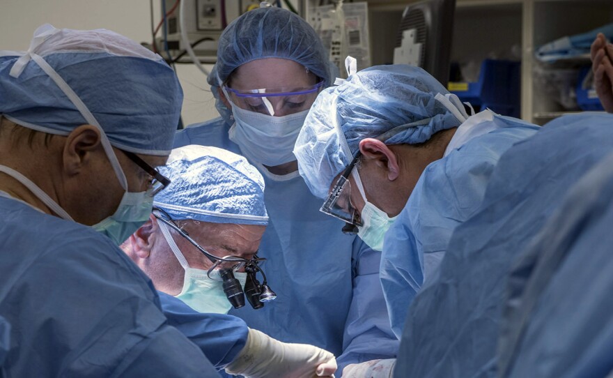 A team of Cleveland Clinic transplant surgeons and gynecological surgeons perform the nation's first uterus transplant during a nine-hour surgery in Cleveland.