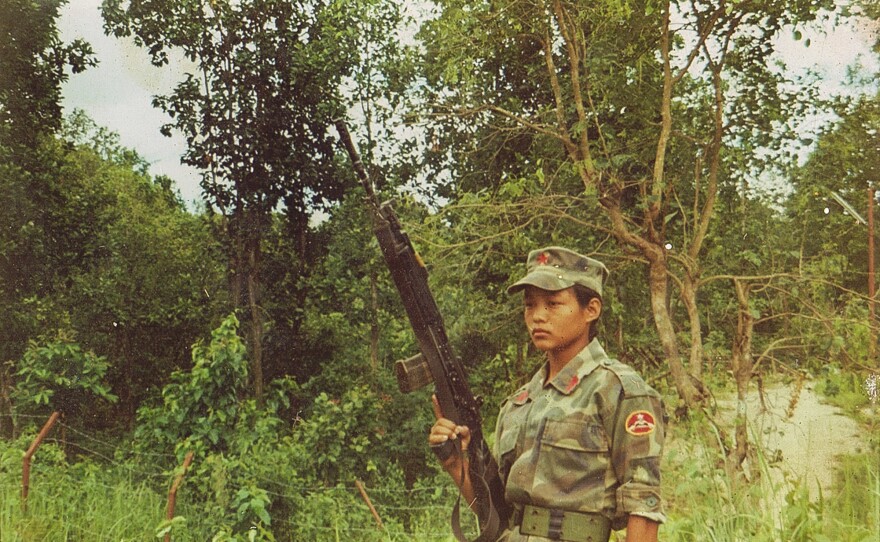 In this undated photo, Rai poses in her Maoist army uniform.