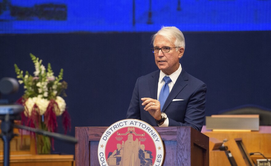 In this undated file photo provided by the County of Los Angeles, incoming Los Angeles County District Attorney George Gascón speaks after he was sworn in a virtual ceremony in downtown Los Angeles.