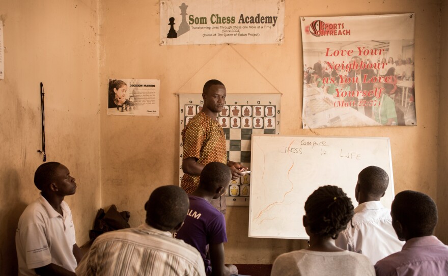 Robert Katende teaches a class at the Katwe Chess Academy, which he founded in 2003.