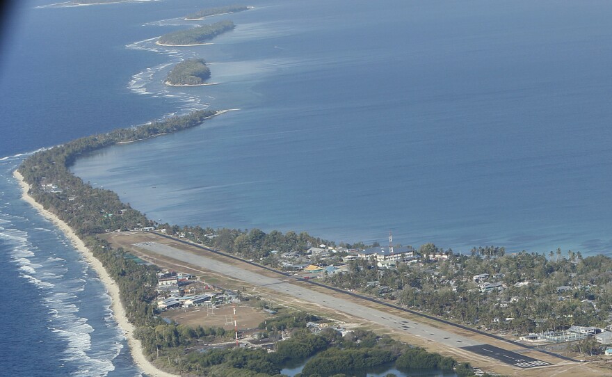 Funafuti, the main island of the nation state of Tuvalu, is photographed from a Royal New Zealand airforce C130 aircraft as it approaches the tiny South Pacific nation.