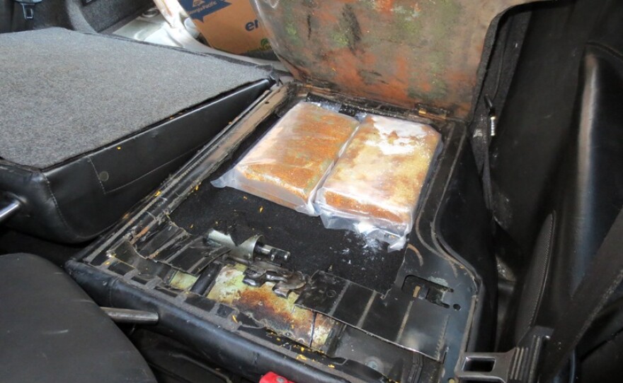 Above: agents located drugs hidden inside an electronically controlled compartment, March 5, 2014.