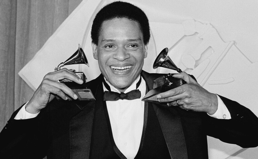 Al Jarreau celebrates after the 1982 Grammys in Los Angeles. Jarreau won honors that year for best pop male vocalist and best jazz male vocalist.