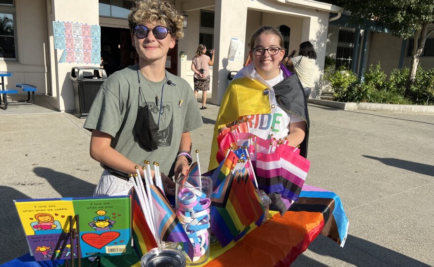 Téa Wagstaff, 17, and Izzy Enfinger, 17, share symbols of LGBTQ support in the Mustang Commons at San Dieguito Academy, Wednesday, Encinitas, Calif., September 14, 2022