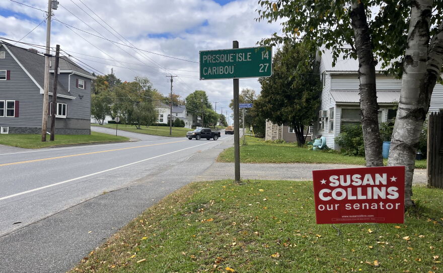 A campaign sign sits on a lawn along U.S. Route 1 in Aroostook County, Maine.