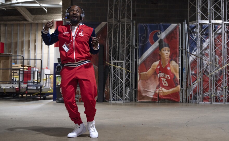 Wizdom dancer Christopher Johnson, 53, rehearses while the rest of the team gets ready in locker rooms before their second-to-last performance of the season. Johnson is a special needs educator when he's not dancing and says that music and dance have played an integral role in his life.