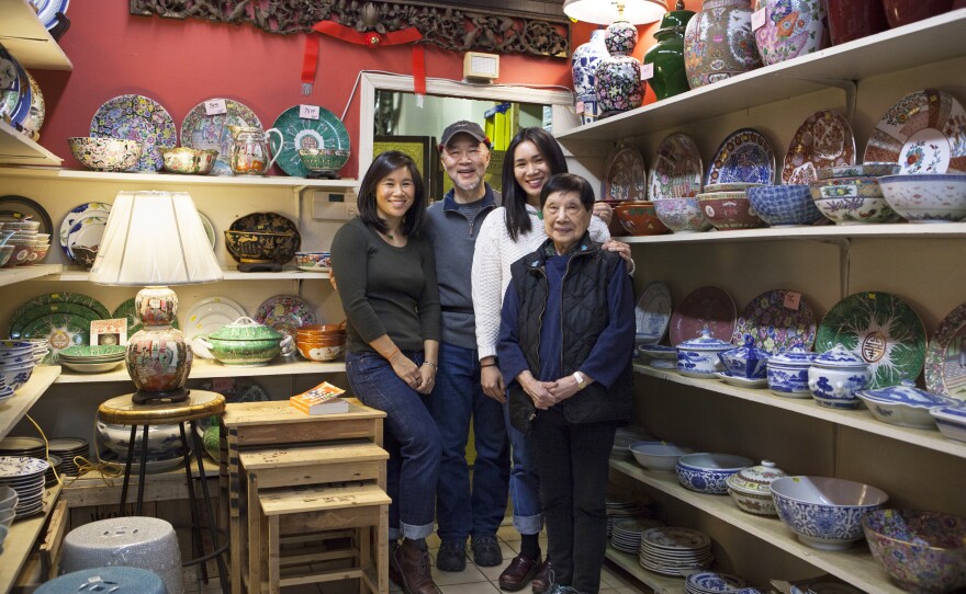 Three generations — Mei's sister Lina (left), her father Gary, Mei and her grandmother Nancy— help run Wing On Wo.