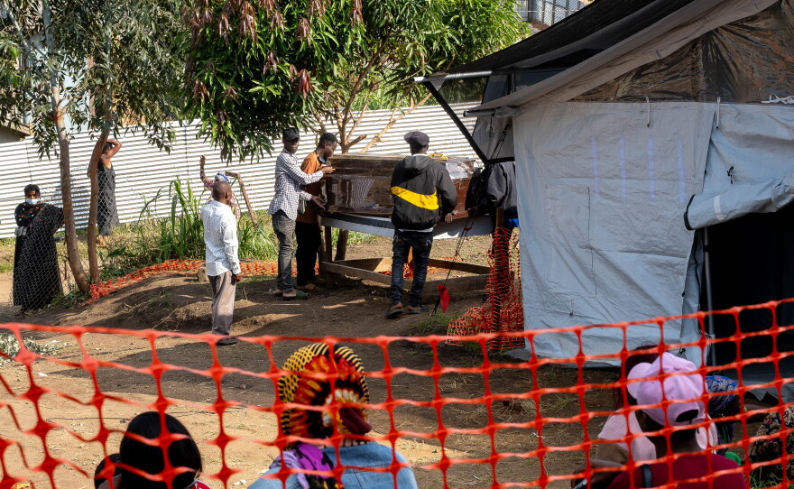A view of the morgue at the Ebola treatment center of the Evangelical Medical Center in Bunia on June 18, as staff prepare the body of a person who died from Ebola. The facility is part of the region's response to the outbreak spreading through eastern Congo.