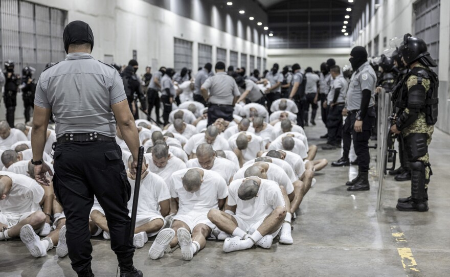 This 2025 photo, provided to the press by the El Salvador presidential press office, shows Venezuelan deportees from the U.S. in the notorious CECOT prison. Venezuelans have since been released, but many Salvadoran nationals deported to their home country remain in detention.