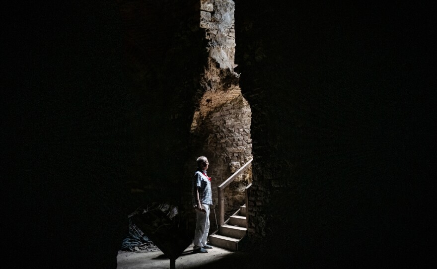 Archaeologist Ferudun Ozgumus stands in what is believed to be a Byzantine-era substructure in Istanbul.