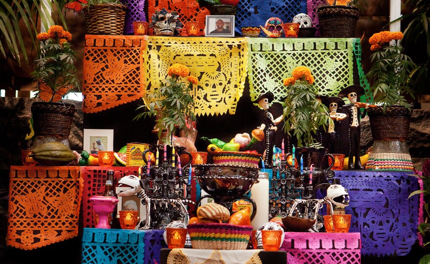 Altar: Altars are used to welcome the ancestors' spirits into the home. It is also practice to visit the ancestral burial ground to celebrate with picnics and music.