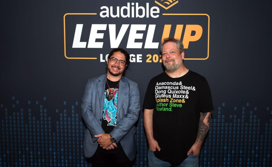Author Matt Dinniman and audiobook narrator Jeff Hays attend the "Level-Up Lounge" activation in downtown San Diego on July 25, 2026.
