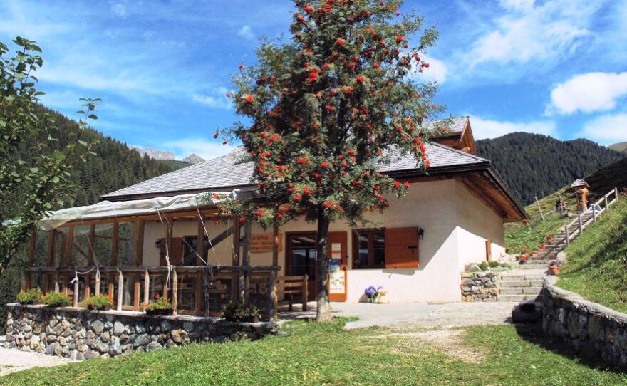 Francesco Lenzi's homestead in a region in the Italian Alps called Trentino. Lenzi, a cheese maker and farmer, raises cows that can be "adopted" by locals or visitors through the Adopt A Cow Program.