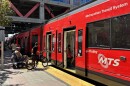 Passengers board a trolley at the 12th and Imperial Transit Center, Aug. 21, 2025.