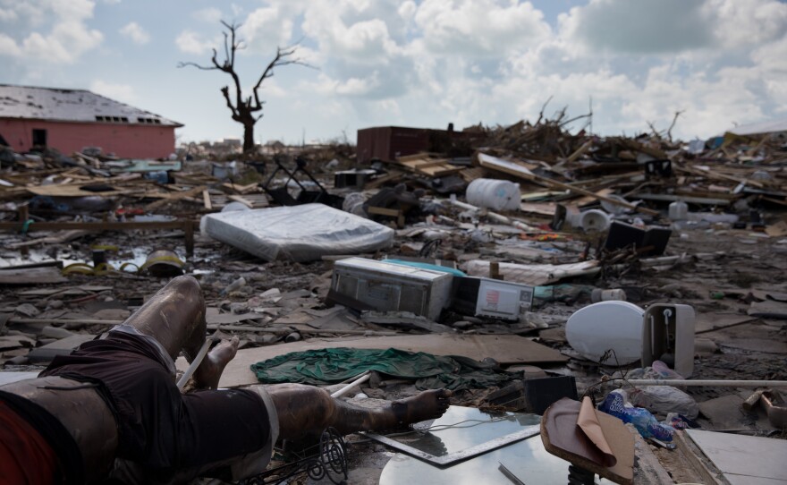 Bodies lay in the debris left by Hurricane Dorian, which decimated Marsh Harbour on Great Abaco Island in the Bahamas on Sept. 6. The Mudd, an immigrant shantytown in Marsh Harbour, was home to about 8,000 Haitians, some of whom have lived in the area for several generations.