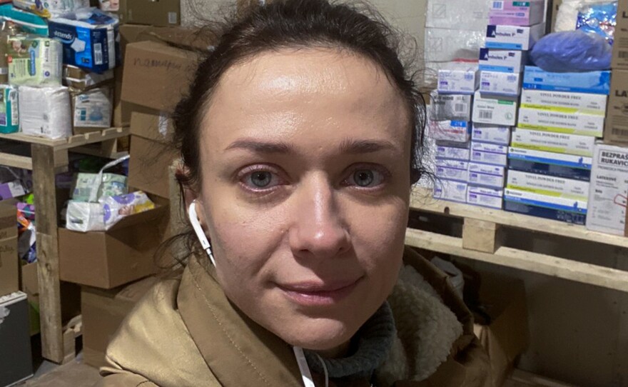 Aleksandra Shchebet took this selfie in a warehouse in Lutsk where for months she spent long days packing up donated food and medical supplies. She has now returned to Kyiv to treat patients.