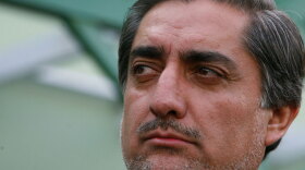 Abdullah Abdullah is seen after announcing his decision not to participate in Afghanistan's runoff election during a news conference Sunday in Kabul.  On Monday, Abdullah told NPR that "massive fraud" in the presidential election made it impossible to go forward with a campaign.