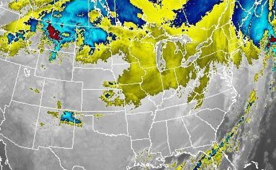It's been a big storm: The worst may have been over, but an early Friday satellite image shows that bad weather still stretched across much of the nation.