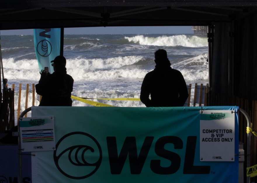 Spectators gather to watch the inaugural WSL Junior Championships at Oceanside Pier on Jan. 11, 2024.