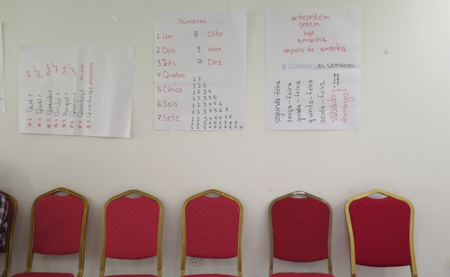 Basic Portuguese phrases and vocabulary are tacked up on the walls of the music institute classroom in Doha. The group of students, faculty and family members reached Lisbon last week.