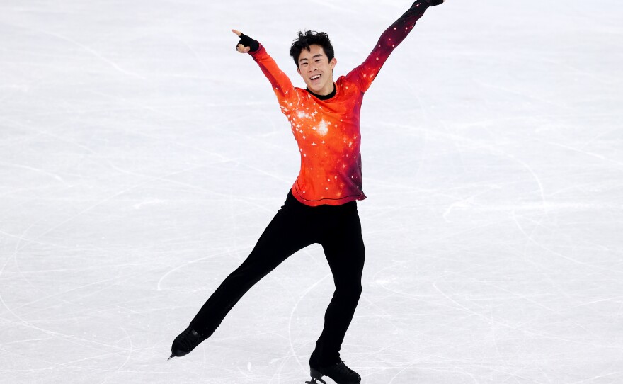 Nathan Chen reacts during his performance at the men's figure skating program in Beijing.