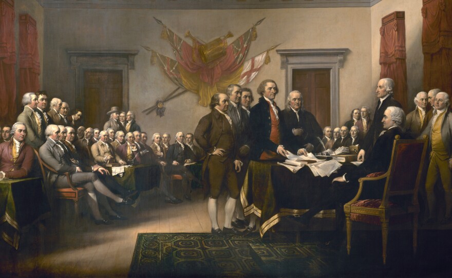 Thomas Jefferson, the principal author of the Declaration of Independence, is shown placing the document before John Hancock, president of the Congress, in this painting by John Trumbull.