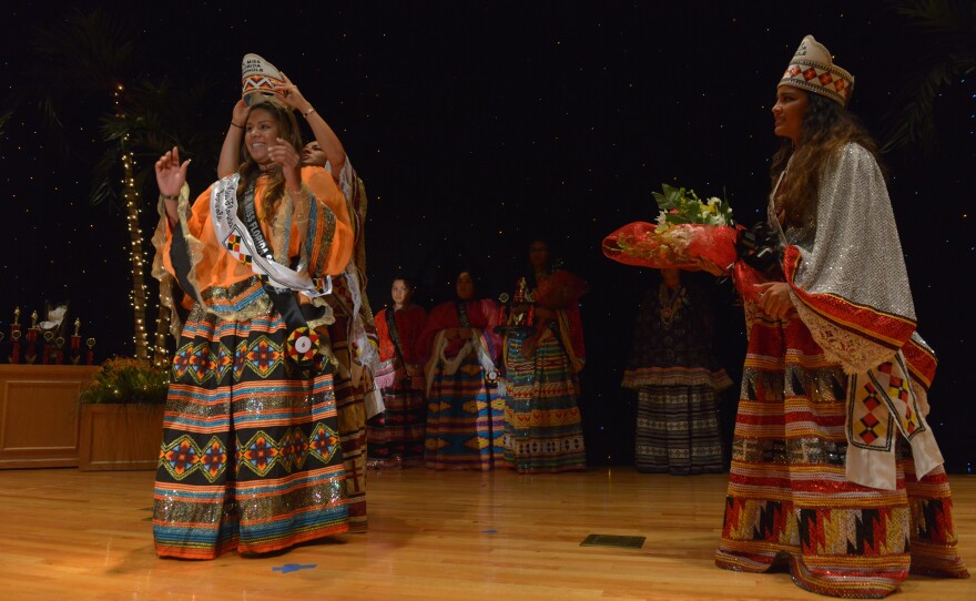 Sky Osceola, 16, is crowned Jr. Miss Florida Seminole. Her mother Francine Osceola hand-made her pageant dress. At right is the outgoing Miss Florida Seminole Princess, Brianna Nunez.