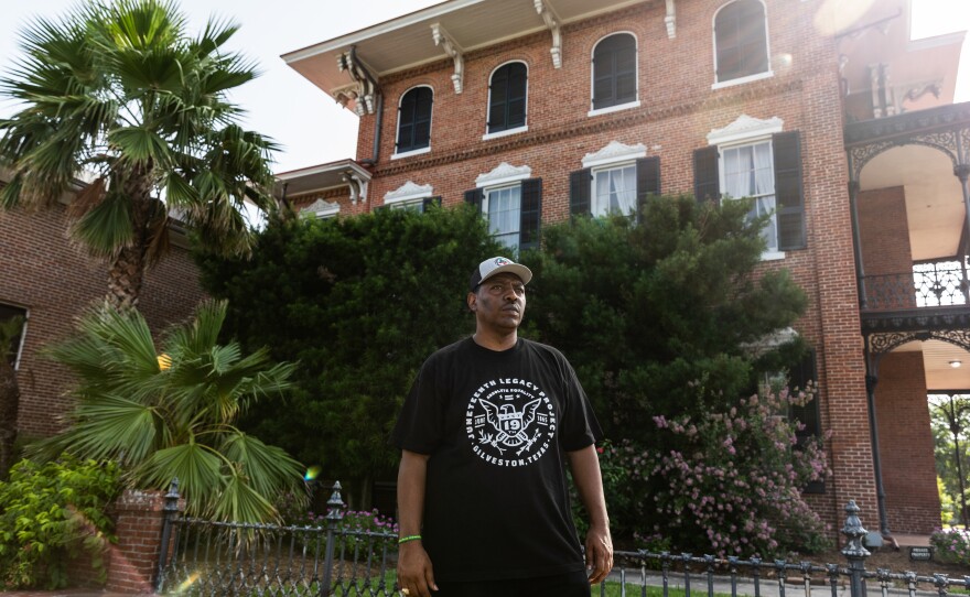 Sam Collins poses for a portrait at the historic home, Ashton Villa.