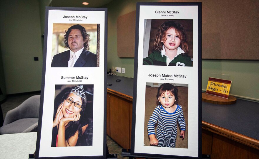 This photo display at a November 2013 press conference shows Joseph and Summer McStay, and their children Gianni and Joseph Mateo.