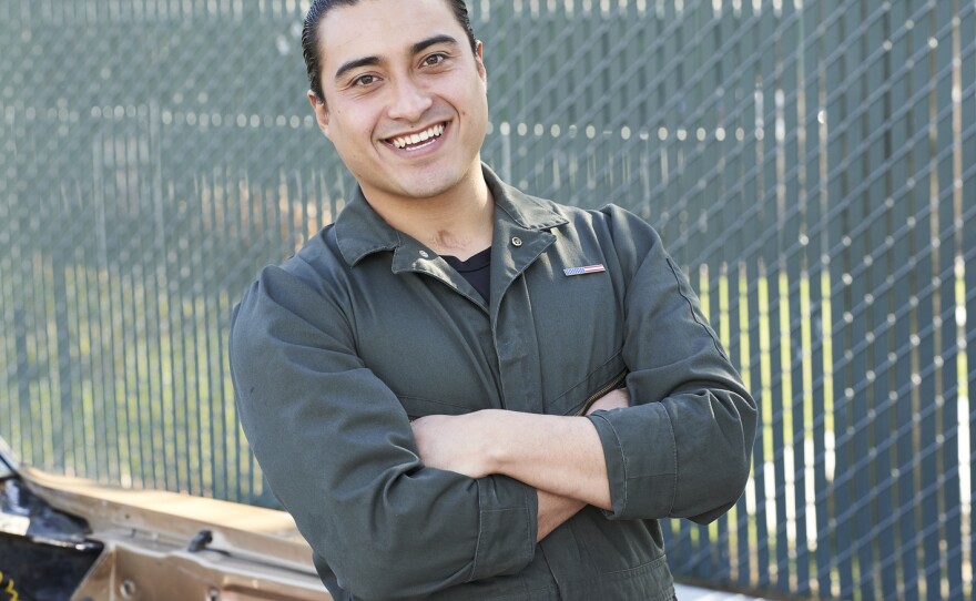 Diego Aguilar works at a trade center at East Bay Municipal Utility District in Oakland, Calif.