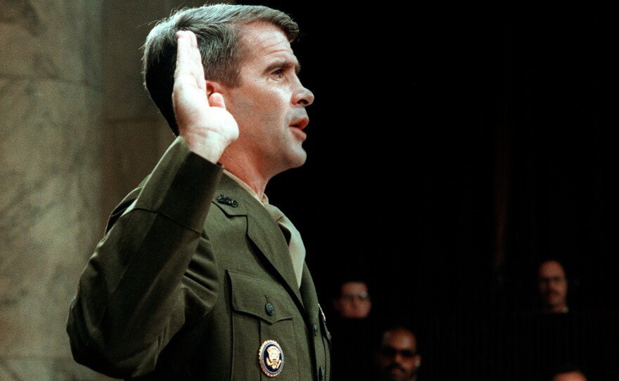 Lieutenant-Colonel Oliver North, is sworn in July 7, 1987 before the House and Senate Foreign Affairs Committee hearing in Washington, D.C. on the Iran-Contra Affair