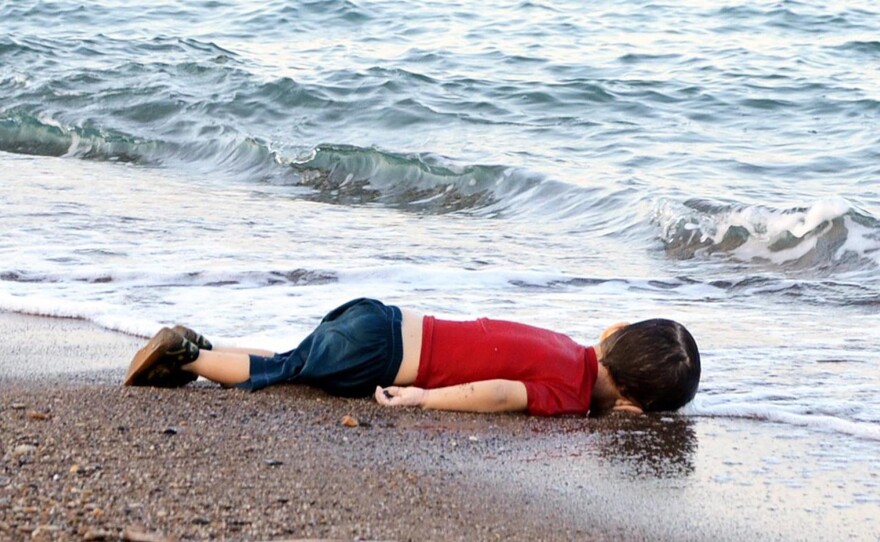 Aylan Kurdi's body lies on the shores of Bodrum, southern Turkey, in September 2015 after a boat carrying 23 migrants sank while reaching the Greek island of Kos.