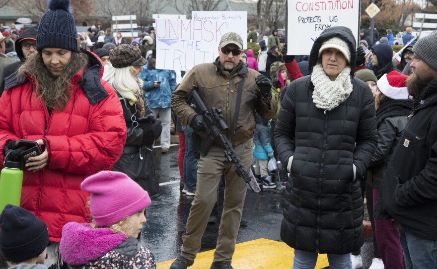 Protesters gather outside Central District Health's office in Boise, Idaho, on Dec. 15, 2020.
