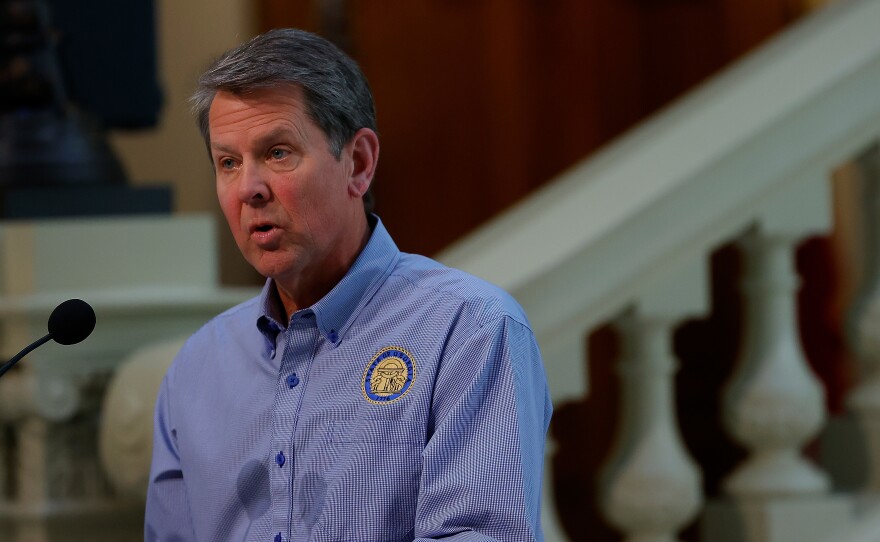 Georgia Gov. Brian Kemp speaks to the media during a news conference on April 27 in Atlanta.