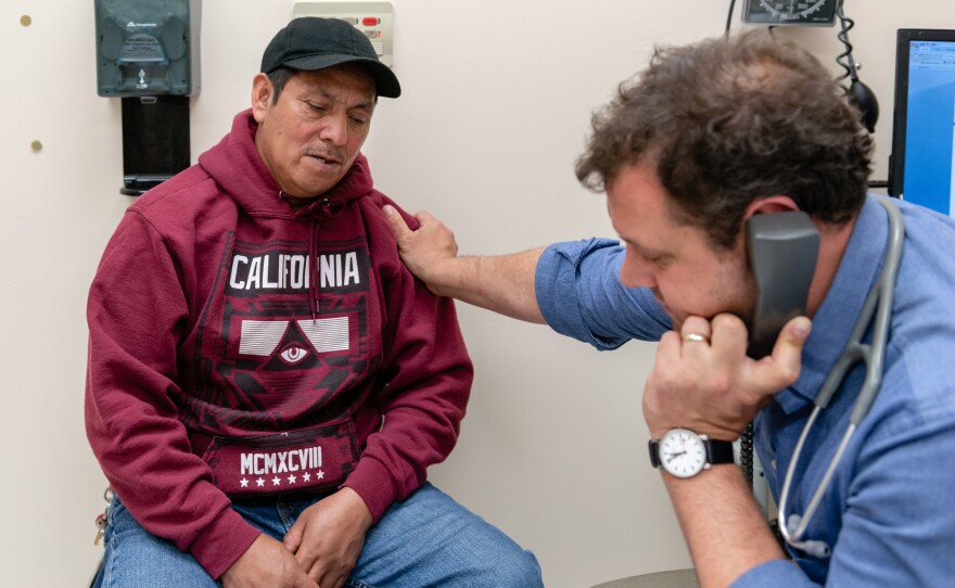 Juan Lopez Aguilar (left), a Maya man who fled violence in Guatemala three years ago, tells Dr. Nick Nelson he fears returning to the land of his birth. "There are a lot of gangs," he tells the doctor. "They want to kill people in my community."