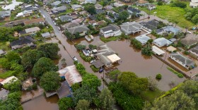 Streets are flooded from severe rains Friday in Haleiwa, Hawaii.