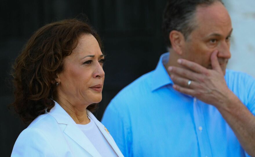 Second Gentleman Doug Emhoff wipes away a tear as he and Vice President Harris tour Ghana's Cape Coast slave castle.