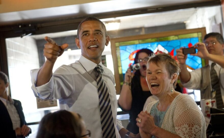 President Obama greets patrons at Ross' Restaurant in Bettendorf, Iowa, on Tuesday. In 2008, the president's unexpected victory in the state helped propel his campaign.