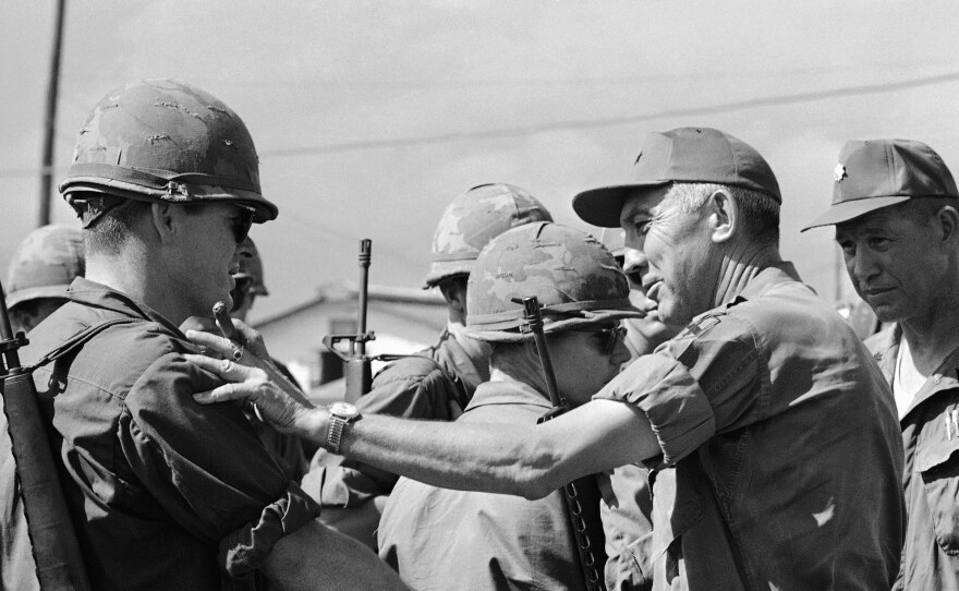 Lt. General William Peers, second from right, talks to an officer of the National Guard's 116th Combat Engineer Battalion of Idaho Falls, Idaho, at Phan Rang, South Vietnam, Saturday, September 18, 1968. At the time, many saw the National Guard as a way to get out of the draft, but eight units were ultimately sent to Vietnam, including the 116th Battalion.