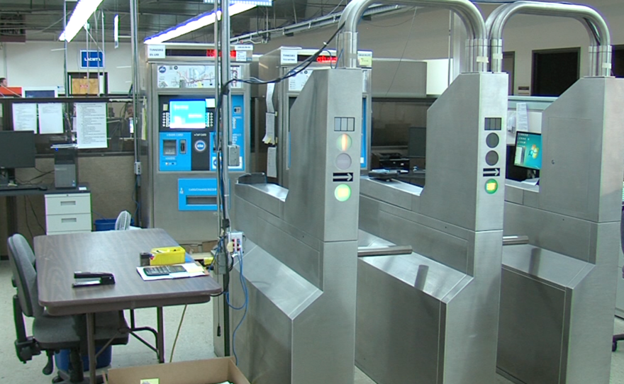 A model of a Chicago Transit Authority turnstile is seen at the Cubic Corp. headquarters in this undated photo. The San Diego-based company developed the Compass Card.