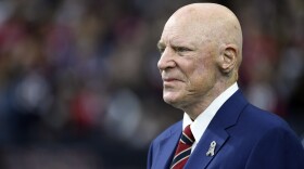 Houston Texans owner Bob McNair watches warm ups before an NFL football game against the New Orleans Saints in Houston, Nov. 29, 2015. 