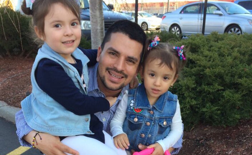 In this undated family photo provided by Sandra Chica, Pablo Villavicencio poses with his two daughters, Luciana, left, and Antonia.